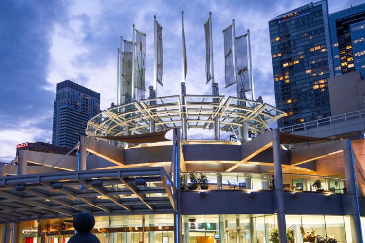 Color photograph of the enterance to the Metro Toronto Covention Centre at Dusk