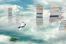 an airplane soars through towers of books